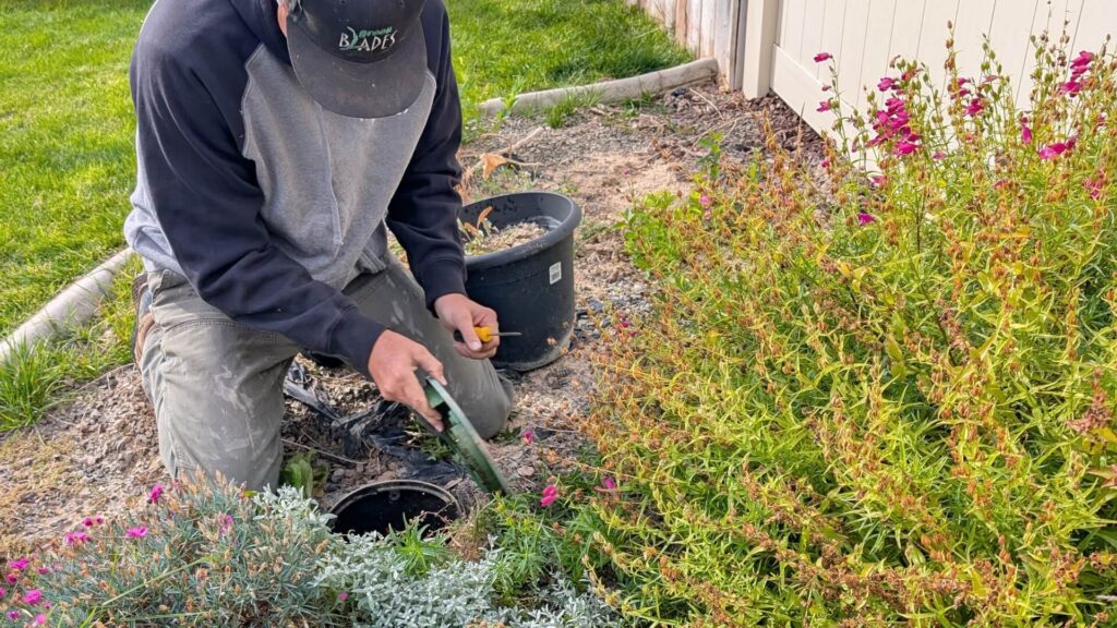 Greenblades Guy Checking The Sprinkler System
